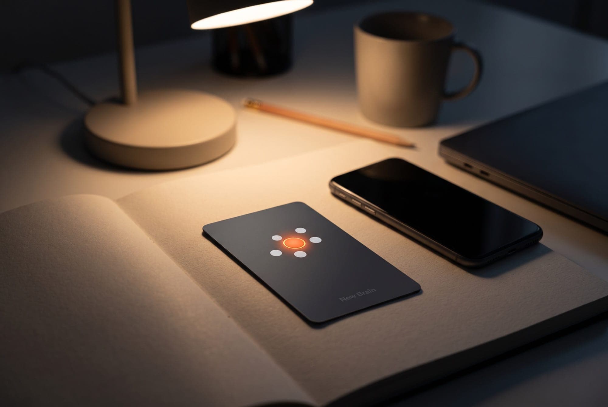New Brain Card on a desk in the evening, its core light on